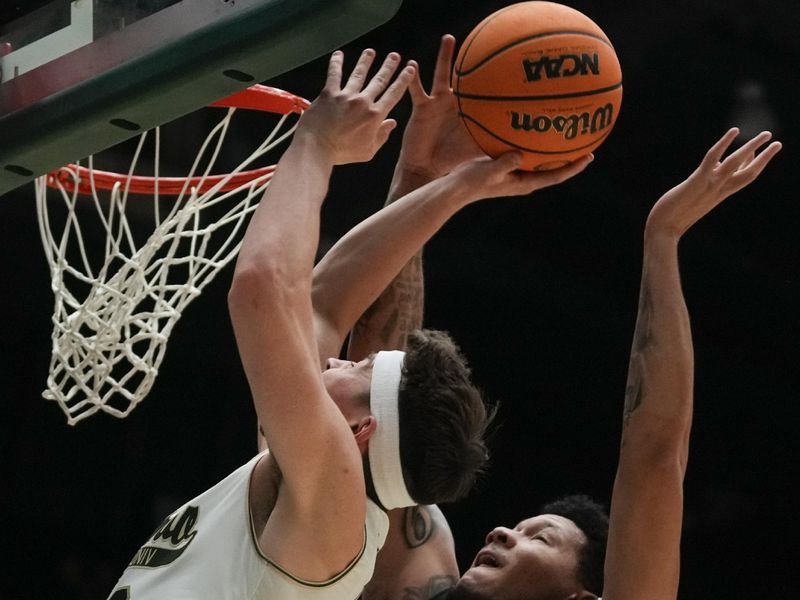 Feb 27, 2024; Fort Collins, Colorado, USA; Colorado State Rams guard Joe Palmer (20) draws a foul from Nevada Wolf Pack forward Tylan Pope (33) during the second half  at Moby Arena. Mandatory Credit: Michael Madrid-USA TODAY Sports