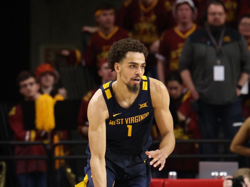 Feb 27, 2023; Ames, Iowa, USA; West Virginia Mountaineers forward Emmitt Matthews Jr. (1) sets the offense against the Iowa State Cyclones during the second half at James H. Hilton Coliseum. Mandatory Credit: Reese Strickland-USA TODAY Sports