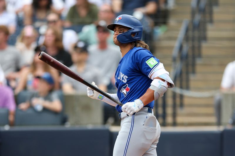 Mar 16, 2024; Tampa, Florida, USA;  Toronto Blue Jays shortstop Bo Bichette (11) hits a two-run home run against the New York Yankees in the sixth inning at George M. Steinbrenner Field. Mandatory Credit: Nathan Ray Seebeck-USA TODAY Sports