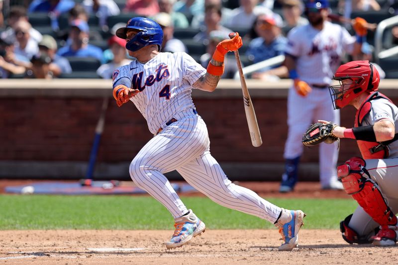 Aug 27, 2023; New York City, New York, USA; New York Mets catcher Francisco Alvarez (4) follows through on an RBI single against the Los Angeles Angels during the fourth inning at Citi Field. Mandatory Credit: Brad Penner-USA TODAY Sports