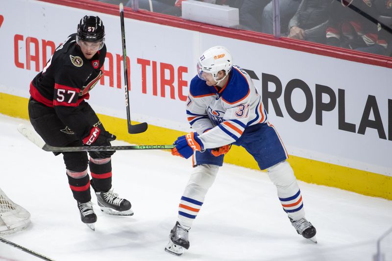 Mar 24, 2024; Ottawa, Ontario, CAN; Ottawa Senators center Shane Pinto (57) looses his stick while battling with Edmonton Oilers left wing Warren Foegele (37) in the third period at the Canadian Tire Centre. Mandatory Credit: Marc DesRosiers-USA TODAY Sports