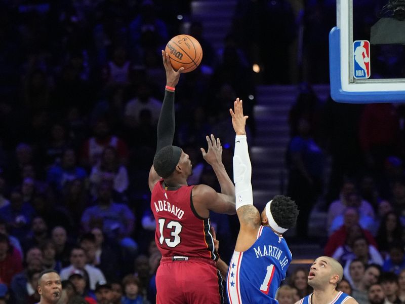 PHILADELPHIA, PA - MARCH 18: Bam Adebayo #13 of the Miami Heat drives to the basket during the game against the Philadelphia 76ers on March 18, 2024 at the Wells Fargo Center in Philadelphia, Pennsylvania NOTE TO USER: User expressly acknowledges and agrees that, by downloading and/or using this Photograph, user is consenting to the terms and conditions of the Getty Images License Agreement. Mandatory Copyright Notice: Copyright 2024 NBAE (Photo by Jesse D. Garrabrant/NBAE via Getty Images)