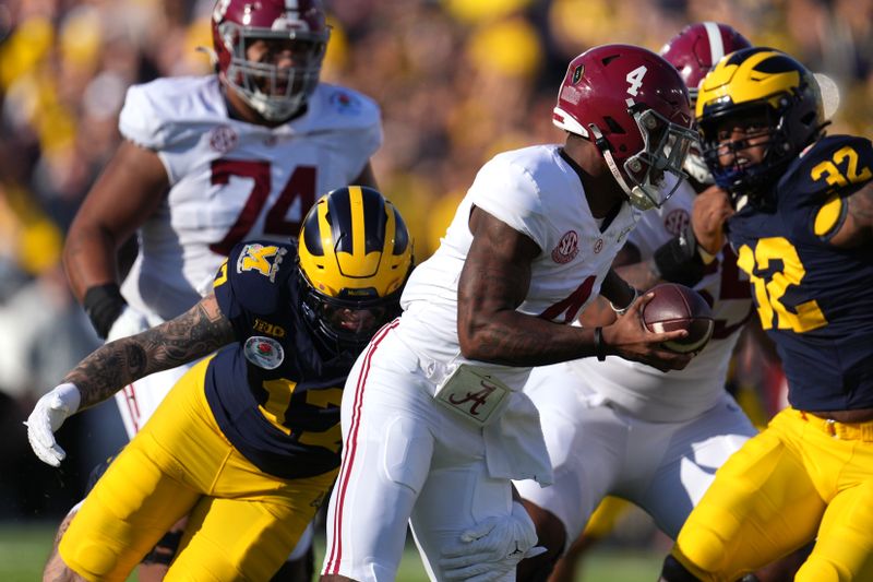 Jan 1, 2024; Pasadena, CA, USA; Alabama Crimson Tide quarterback Jalen Milroe (4) is sacked by Michigan Wolverines defensive end Braiden McGregor (17) during the first half in the 2024 Rose Bowl college football playoff semifinal game at Rose Bowl. Mandatory Credit: Kirby Lee-USA TODAY Sports