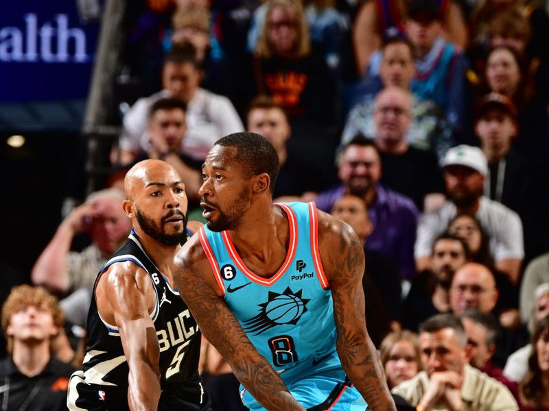 PHOENIX, AZ - MARCH 14: Jevon Carter #5 of the Milwaukee Bucks plays defense on Terrence Ross #8 of the Phoenix Suns on March 14, 20223at Footprint Center in Phoenix, Arizona. NOTE TO USER: User expressly acknowledges and agrees that, by downloading and or using this photograph, user is consenting to the terms and conditions of the Getty Images License Agreement. Mandatory Copyright Notice: Copyright 2023 NBAE (Photo by Barry Gossage/NBAE via Getty Images)