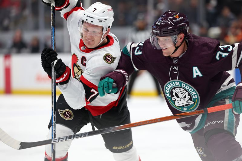 Mar 6, 2024; Anaheim, California, USA;  Ottawa Senators left wing Brady Tkachuk (7) fights for the puck against Anaheim Ducks right wing Jakob Silfverberg (33) during the first period at Honda Center. Mandatory Credit: Kiyoshi Mio-USA TODAY Sports