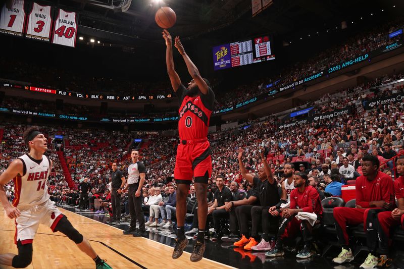 MIAMI, FL - APRIL 12: Javon Freeman-Liberty #0 of the Toronto Raptors shoots the ball during the game against the Miami Heat   on April 12, 2024 at Kaseya Center in Miami, Florida. NOTE TO USER: User expressly acknowledges and agrees that, by downloading and or using this Photograph, user is consenting to the terms and conditions of the Getty Images License Agreement. Mandatory Copyright Notice: Copyright 2024 NBAE (Photo by Issac Baldizon/NBAE via Getty Images)