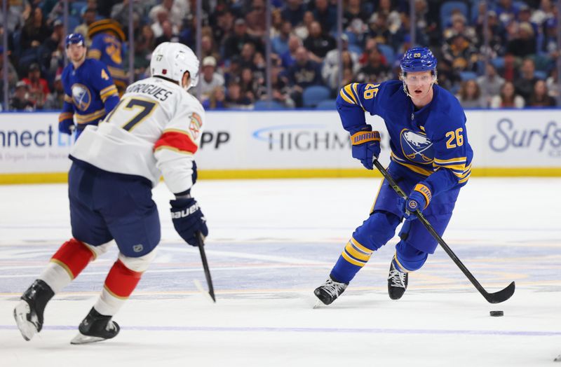 Oct 18, 2025; Buffalo, New York, USA;  Buffalo Sabres defenseman Rasmus Dahlin (26) skates up ice with the puck during the second period against the Florida Panthers at KeyBank Center. Mandatory Credit: Timothy T. Ludwig-Imagn Images