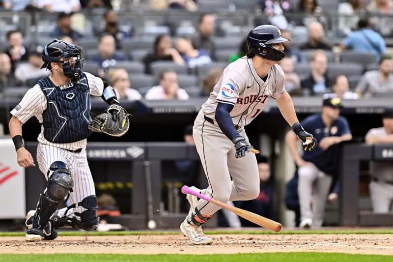 May 9, 2024; Bronx, New York, USA; Houston Astros outfielder Joey Loperfido (10) hits an infield single during the second inning against the New York Yankees at Yankee Stadium. Mandatory Credit: John Jones-USA TODAY Sports