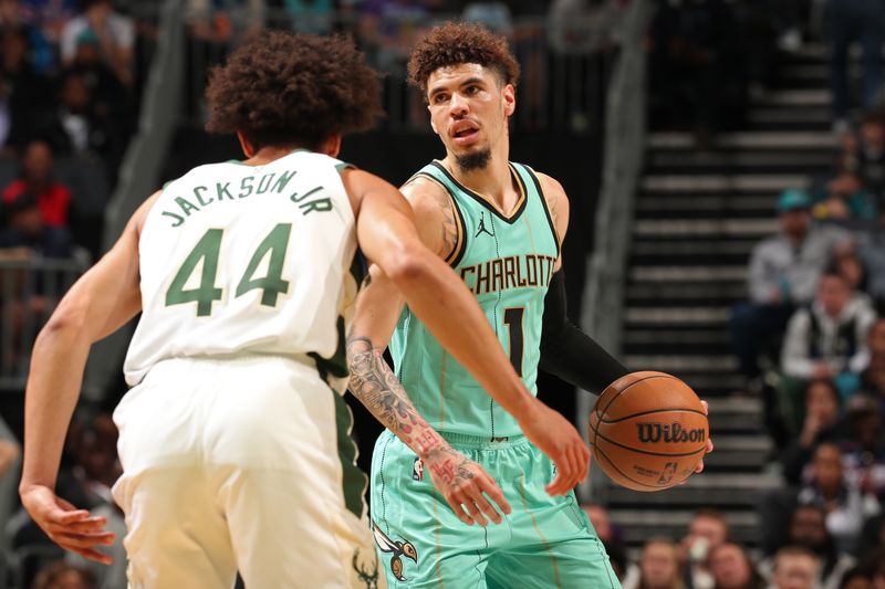 CHARLOTTE, NC - NOVEMBER 16: LaMelo Ball #1 of the Charlotte Hornets looks on during the game against the Milwaukee Bucks on November 16, 2024 at Spectrum Center in Charlotte, North Carolina. NOTE TO USER: User expressly acknowledges and agrees that, by downloading and or using this photograph, User is consenting to the terms and conditions of the Getty Images License Agreement. Mandatory Copyright Notice: Copyright 2024 NBAE (Photo by Kent Smith/NBAE via Getty Images)