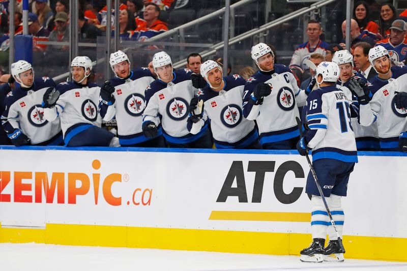 Oct 9, 2024; Edmonton, Alberta, CAN; The Winnipeg Jets celebrate a goal scored by forward Rasmus Kupari (15) during the second period against the Edmonton Oilers at Rogers Place. Mandatory Credit: Perry Nelson-Imagn Images