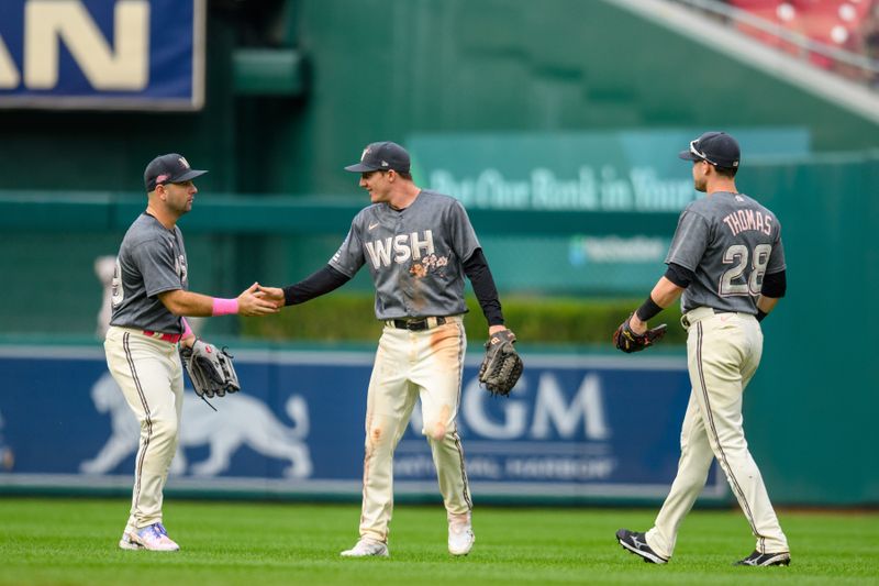 Sep 24, 2023; Washington, District of Columbia, USA; Washington Nationals right fielder Lane Thomas (28) reacts with teammates after wining the game against the Atlanta Braves at Nationals Park. Mandatory Credit: Reggie Hildred-USA TODAY Sports