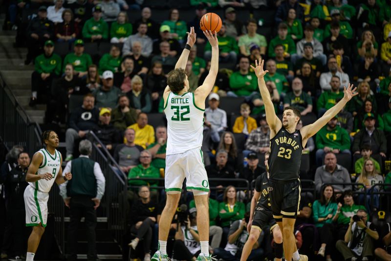Jan 18, 2025; Eugene, Oregon, USA; Oregon Ducks center Nate Bittle (32) shoots a three point shot during the second half against the Purdue Boilermakers at Matthew Knight Arena. Mandatory Credit: Craig Strobeck-Imagn Images