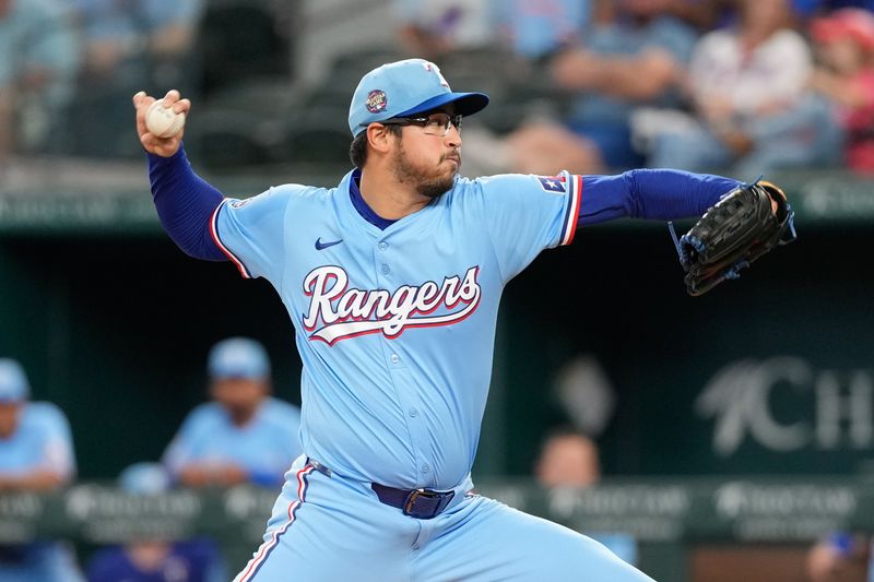 Apr 28, 2024; Arlington, Texas, USA; Texas Rangers starting pitcher Michael Lorenzen (23) delivers a pitch to the Cincinnati Reds during the first inning at Globe Life Field. Mandatory Credit: Jim Cowsert-USA TODAY Sports