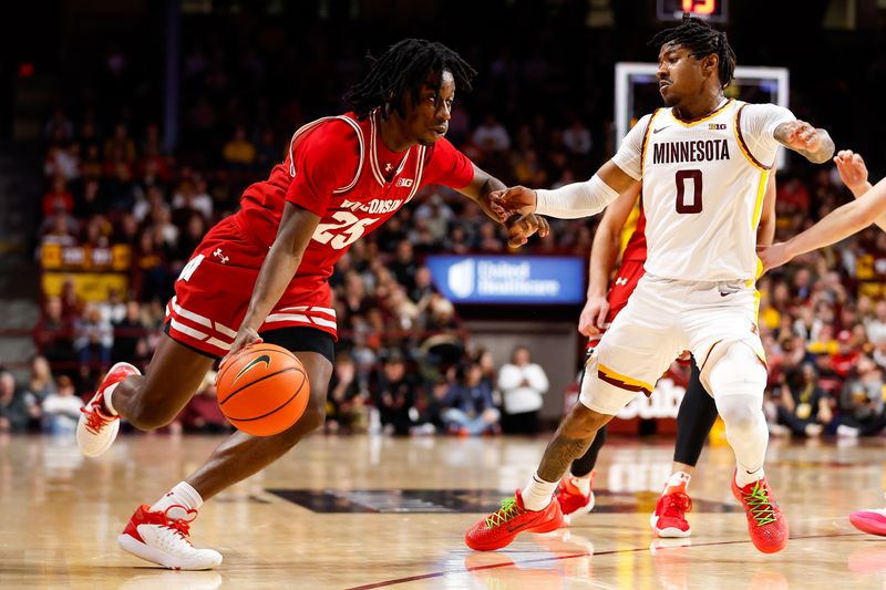 Jan 23, 2024; Minneapolis, Minnesota, USA; Wisconsin Badgers guard John Blackwell (25) works around Minnesota Golden Gophers guard Elijah Hawkins (0) during the second half at Williams Arena. Mandatory Credit: Matt Krohn-USA TODAY Sports