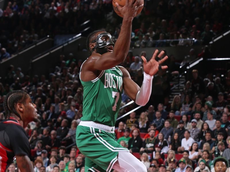 PORTLAND, OR - MARCH 17: Jaylen Brown #7 of the Boston Celtics drives to the basket during the game against the Portland Trail Blazers on March 17, 2023 at the Moda Center Arena in Portland, Oregon. NOTE TO USER: User expressly acknowledges and agrees that, by downloading and or using this photograph, user is consenting to the terms and conditions of the Getty Images License Agreement. Mandatory Copyright Notice: Copyright 2023 NBAE (Photo by Cameron Browne/NBAE via Getty Images)