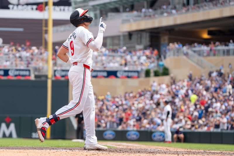 Jul 21, 2024; Minneapolis, Minnesota, USA; Minnesota Twins designated hitter Trevor Larnach (9) completes a trip around the bases after hitting a two-run home run in the fifth inning against the Milwaukee Brewers at Target Field. Mandatory Credit: Matt Blewett-USA TODAY Sports