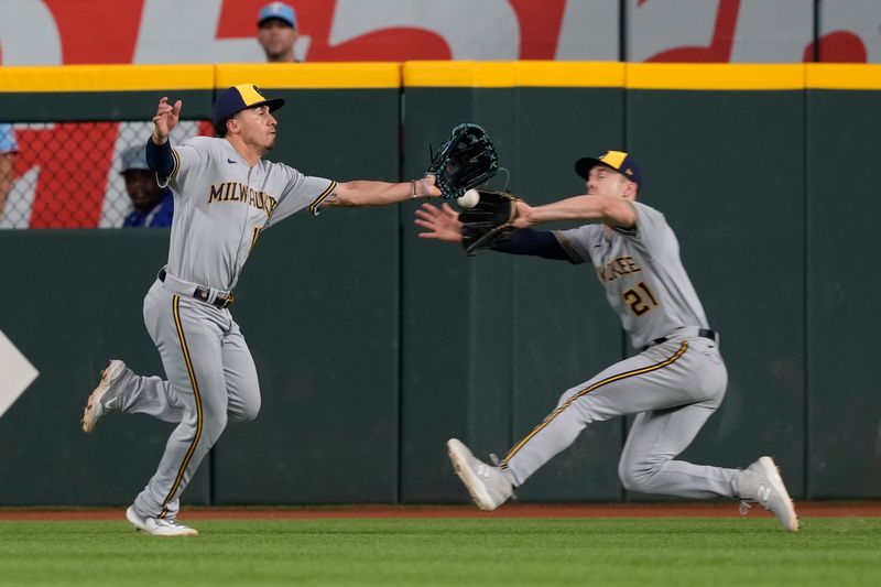 Aug 20, 2023; Arlington, Texas, USA; Milwaukee Brewers right fielder Mark Canha (21) catches the fly-out in front of right fielder Tyrone Taylor (15) hit by Texas Rangers shortstop Corey Seager (not shown) during the fifth inning at Globe Life Field. Mandatory Credit: Jim Cowsert-USA TODAY Sports