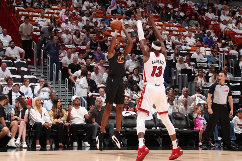 MIAMI, FL - APRIL 28:  Evan Mobley #4 of the Cleveland Cavaliers shoots the ball during the game against the Miami Heat during Round 1 Game 4 on April 28, 2025 at Kaseya Center in Miami, Florida. NOTE TO USER: User expressly acknowledges and agrees that, by downloading and or using this Photograph, user is consenting to the terms and conditions of the Getty Images License Agreement. Mandatory Copyright Notice: Copyright 2025 NBAE (Photo by Issac Baldizon/NBAE via Getty Images)