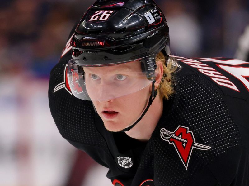 Mar 3, 2024; Buffalo, New York, USA;  Buffalo Sabres defenseman Rasmus Dahlin (26) during a stoppage in play against the Winnipeg Jets during the second period at KeyBank Center. Mandatory Credit: Timothy T. Ludwig-USA TODAY Sports