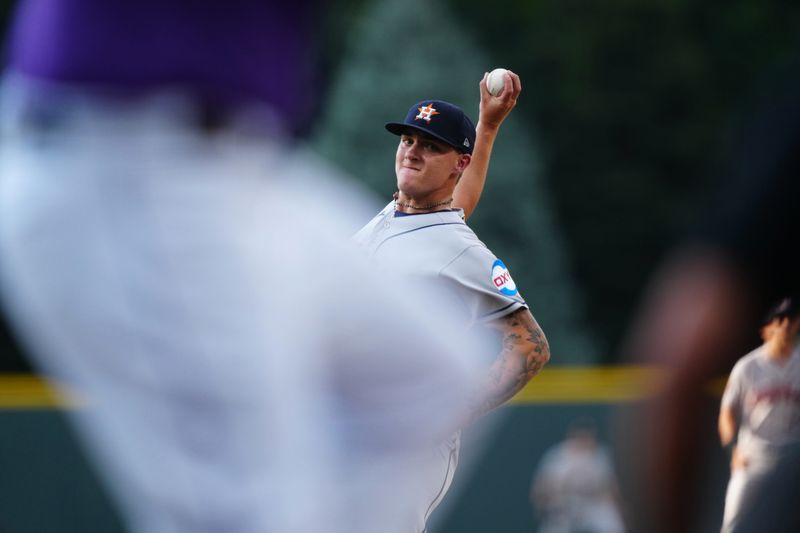 Jul 18, 2023; Denver, Colorado, USA; Houston Astros starting pitcher Hunter Brown (58) delivers a pitch in the first inning against the Colorado Rockies at Coors Field. Mandatory Credit: Ron Chenoy-USA TODAY Sports