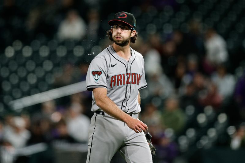 Apr 8, 2024; Denver, Colorado, USA; Arizona Diamondbacks starting pitcher Zac Gallen (23) reacts as he walks to the dugout at the end of the fourth inning against the Colorado Rockies at Coors Field. Mandatory Credit: Isaiah J. Downing-USA TODAY Sports