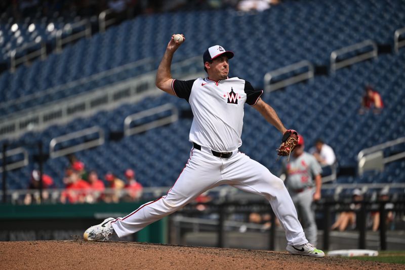 Jul 7, 2024; Washington, District of Columbia, USA; Washington Nationals relief pitcher Derek Law (58) throws a pitch against the St. Louis Cardinals during the seventh inning at Nationals Park. Mandatory Credit: Rafael Suanes-USA TODAY Sports