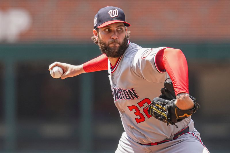 May 15, 2025; Cumberland, Georgia, USA; Washington Nationals pitcher Trevor Williams (32) pitches against the Atlanta Braves during the first inning at Truist Park. Mandatory Credit: Dale Zanine-Imagn Images