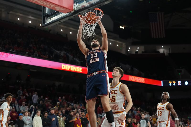 Feb 18, 2026; Los Angeles, California, USA; Illinois Fighting Illini center Tomislav Ivisic (13) dunks the ball against Southern California Trojans center Gabe Dynes (45) in the first half at Galen Center. Mandatory Credit: Kirby Lee-Imagn Images