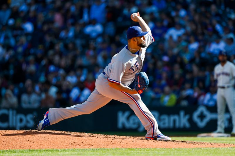 Oct 1, 2023; Seattle, Washington, USA; Texas Rangers relief pitcher Martin Perez (54) throws against the Seattle Mariners during the seventh inning at T-Mobile Park. Mandatory Credit: Joe Nicholson-USA TODAY Sports