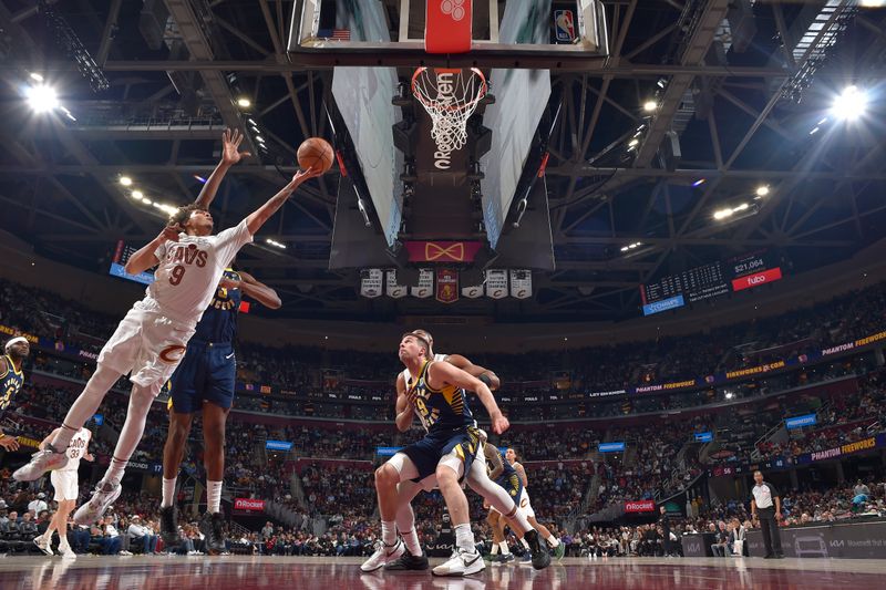 CLEVELAND, OH - APRIL 13: Craig Porter Jr. #9 of the Cleveland Cavaliers drives to the basket during the game against the Indiana Pacers on April 13, 2025 at Rocket Arena in Cleveland, Ohio. NOTE TO USER: User expressly acknowledges and agrees that, by downloading and/or using this Photograph, user is consenting to the terms and conditions of the Getty Images License Agreement. Mandatory Copyright Notice: Copyright 2025 NBAE (Photo by David Liam Kyle/NBAE via Getty Images)
