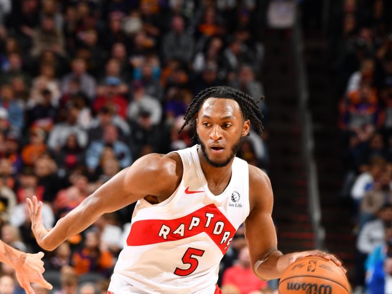 PHOENIX, AZ - MARCH 7: Immanuel Quickley #5 of the Toronto Raptors handles the ball during the game against the Phoenix Suns on March 7, 2024 at Footprint Center in Phoenix, Arizona. NOTE TO USER: User expressly acknowledges and agrees that, by downloading and or using this photograph, user is consenting to the terms and conditions of the Getty Images License Agreement. Mandatory Copyright Notice: Copyright 2024 NBAE (Photo by Barry Gossage/NBAE via Getty Images)