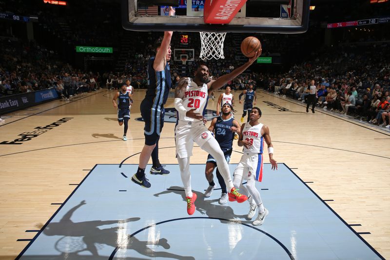 MEMPHIS, TN - APRIL 5: Jaylen Nowell #20 of the Detroit Pistons drives to the basket during the game against the Memphis Grizzlies on April 5, 2024 at FedExForum in Memphis, Tennessee. NOTE TO USER: User expressly acknowledges and agrees that, by downloading and or using this photograph, User is consenting to the terms and conditions of the Getty Images License Agreement. Mandatory Copyright Notice: Copyright 2024 NBAE (Photo by Joe Murphy/NBAE via Getty Images)