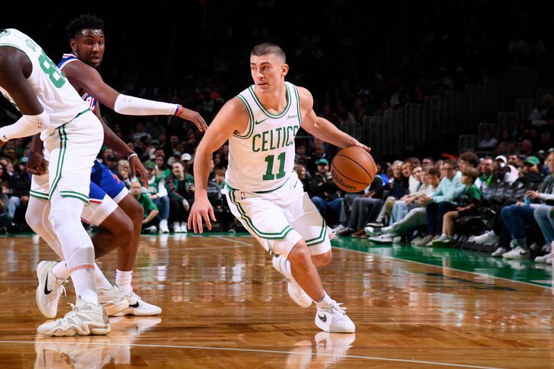 BOSTON, MA - OCTOBER 12: Payton Pritchard #11 of the Boston Celtics handles the ball during the game against the Philadelphia 76ers during a NBA Preseason game on October 12, 2024 at TD Garden in Boston, Massachusetts. NOTE TO USER: User expressly acknowledges and agrees that, by downloading and/or using this Photograph, user is consenting to the terms and conditions of the Getty Images License Agreement. Mandatory Copyright Notice: Copyright 2024 NBAE (Photo by Brian Babineau/NBAE via Getty Images)