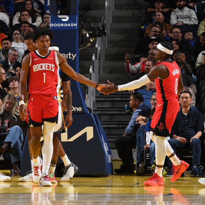 SAN FRANCISCO, CA - DECEMBER 5: Amen Thompson #1 and Aaron Holiday #0 of the Houston Rockets high five during the game against the Golden State Warriors on December 5, 2024 at Chase Center in San Francisco, California. NOTE TO USER: User expressly acknowledges and agrees that, by downloading and or using this photograph, user is consenting to the terms and conditions of Getty Images License Agreement. Mandatory Copyright Notice: Copyright 2024 NBAE (Photo by Noah Graham/NBAE via Getty Images)