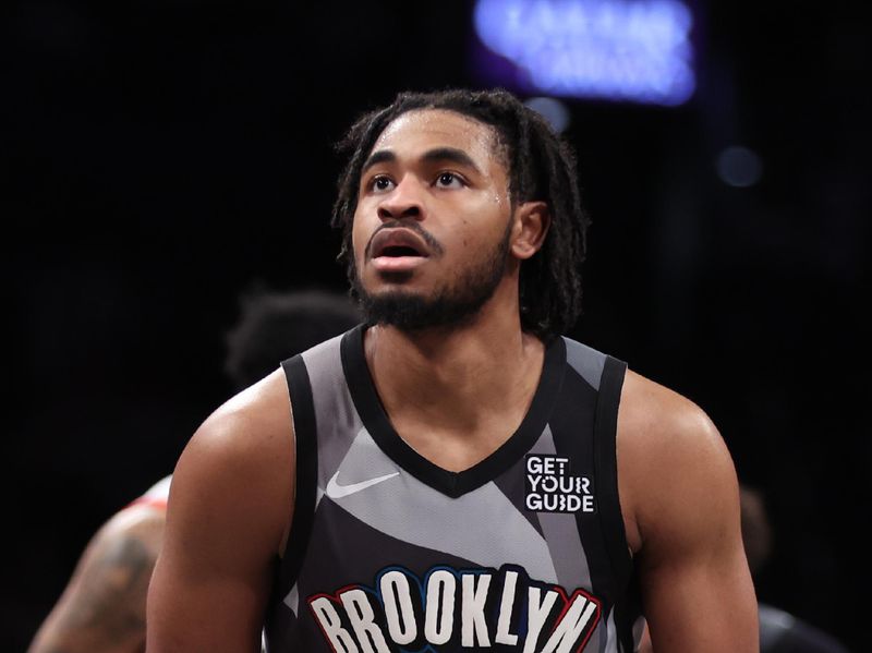 BROOKLYN, NY - FEBRUARY 28:  Cam Thomas #24 of the Brooklyn Nets shoots a free throw during the game against the Portland Trail Blazers on February 28, 2025 at Barclays Center in Brooklyn, New York. NOTE TO USER: User expressly acknowledges and agrees that, by downloading and or using this Photograph, user is consenting to the terms and conditions of the Getty Images License Agreement. Mandatory Copyright Notice: Copyright 2025 NBAE (Photo by Brandon Todd/NBAE via Getty Images)