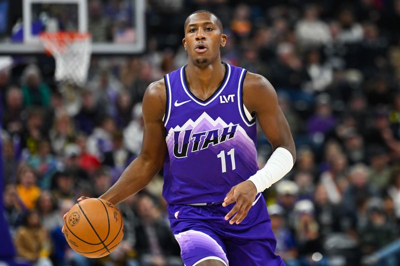 SALT LAKE CITY, UTAH - JANUARY 03: Kris Dunn #11 of the Utah Jazz in action during the first half of a game against the Detroit Pistons at Delta Center on January 03, 2024 in Salt Lake City, Utah. NOTE TO USER: User expressly acknowledges and agrees that, by downloading and or using this photograph, User is consenting to the terms and conditions of the Getty Images License Agreement. (Photo by Alex Goodlett/Getty Images)