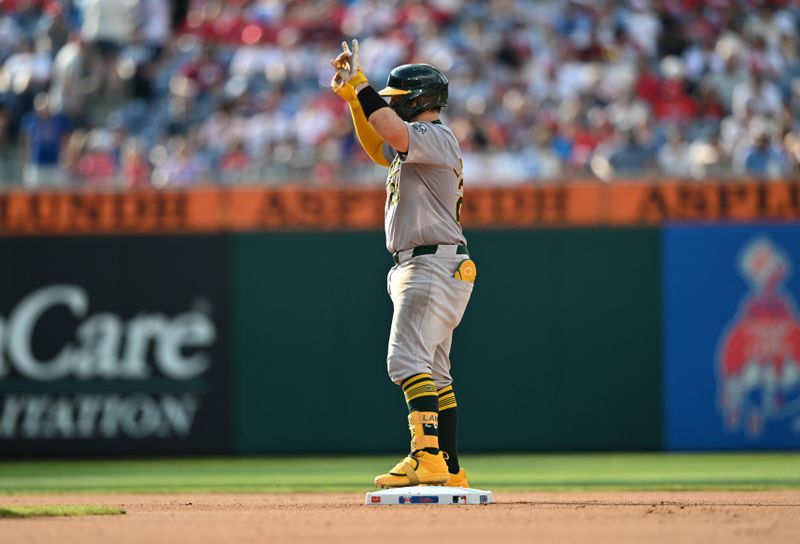 Jul 13, 2024; Philadelphia, Pennsylvania, USA; Oakland Athletics catcher Shea Langeliers (23) reacts after hitting a double against the Philadelphia Phillies in the seventh inning at Citizens Bank Park. Mandatory Credit: Kyle Ross-USA TODAY Sports