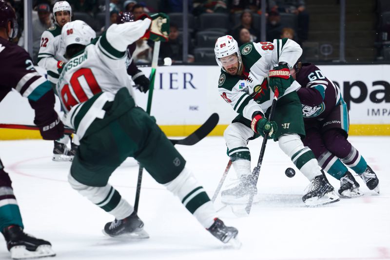 Mar 19, 2024; Anaheim, California, USA; Minnesota Wild center Frederick Gaudreau (89) skates with the puck against the Anaheim Ducks during the third period of a game at Honda Center. Mandatory Credit: Jessica Alcheh-USA TODAY Sports