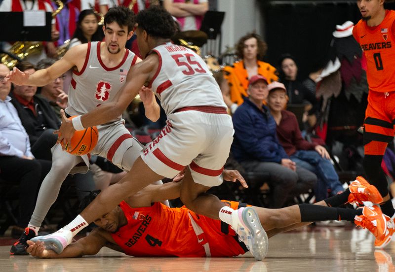 Jan 19, 2023; Stanford, California, USA; Stanford Cardinal forward Harrison Ingram (55) beats Oregon State Beavers guard Dexter Akanno (4) to a loose ball during the first half at Maples Pavilion. Mandatory Credit: D. Ross Cameron-USA TODAY Sports