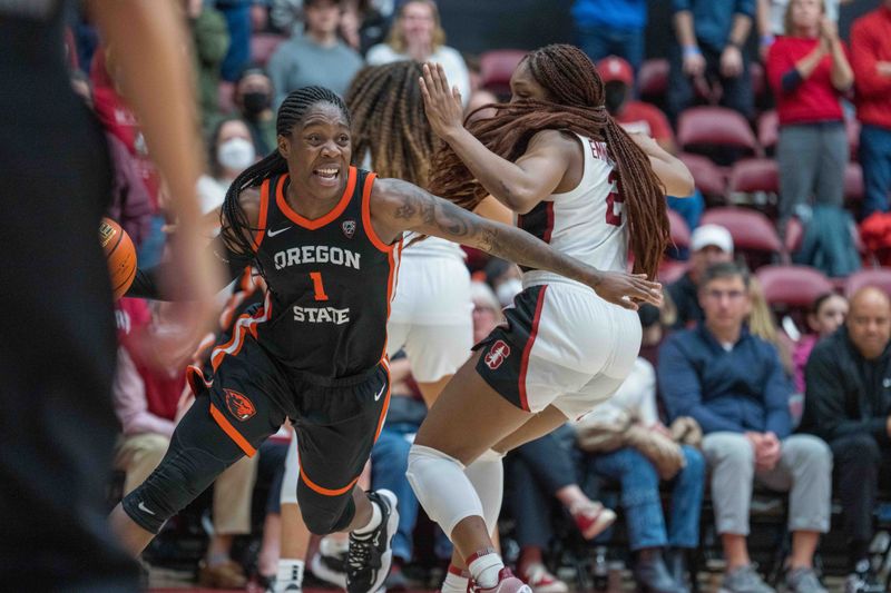 Jan 27, 2023; Stanford, California, USA; Oregon State Beavers guard Bendu Yeaney (1) drives to the net against Stanford Cardinal guard Agnes Emma-Nnopu (2) during the fourth quarter at Maples Pavilion. Mandatory Credit: Neville E. Guard-USA TODAY Sports