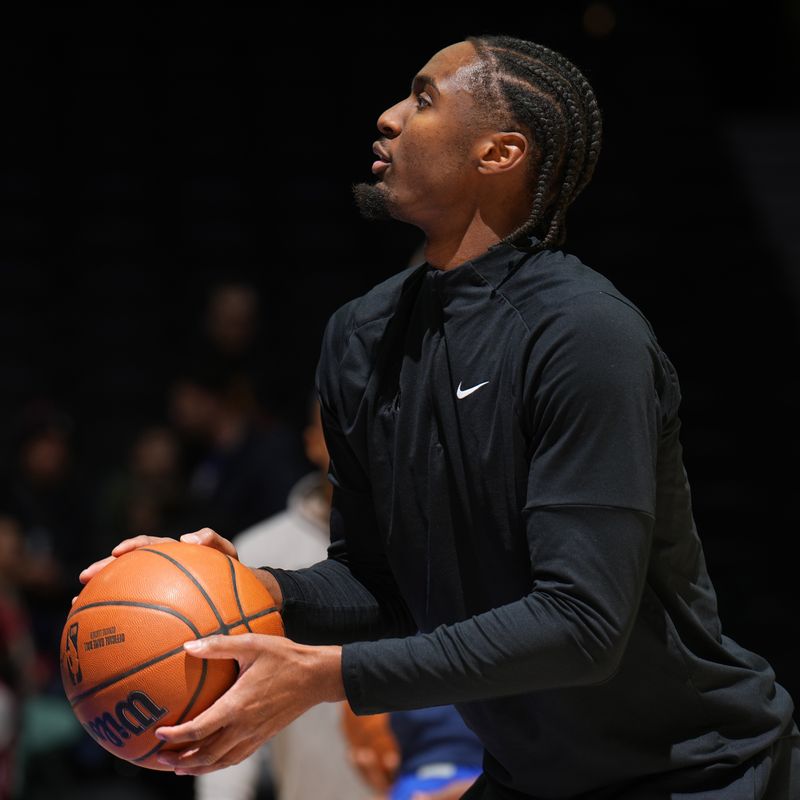 PHILADELPHIA, PA - DECEMBER 4: Tyrese Maxey #0 of the Philadelphia 76ers warms up before the game against the Orlando Magic on December 4, 2024 at the Wells Fargo Center in Philadelphia, Pennsylvania NOTE TO USER: User expressly acknowledges and agrees that, by downloading and/or using this Photograph, user is consenting to the terms and conditions of the Getty Images License Agreement. Mandatory Copyright Notice: Copyright 2024 NBAE (Photo by Jesse D. Garrabrant/NBAE via Getty Images)