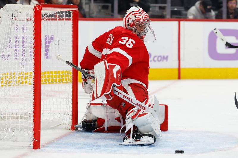 Nov 20, 2025; Detroit, Michigan, USA;  Detroit Red Wings goaltender John Gibson (36) makes the save in the first period against the New York Islanders at Little Caesars Arena. Mandatory Credit: Rick Osentoski-Imagn Images