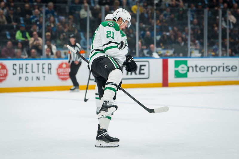 Nov 20, 2025; Vancouver, British Columbia, CAN; Dallas Stars forward Jason Robertson (21) celebrates his goal against the Vancouver Canucks in the first period at Rogers Arena. Mandatory Credit: Bob Frid-Imagn Images