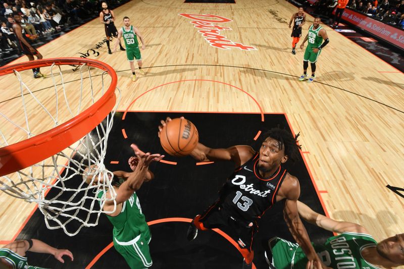 DETROIT, MI - MARCH 22: James Wiseman #13 of the Detroit Pistons drives to the basket during the game against the Boston Celtics on March 22, 2024 at Little Caesars Arena in Detroit, Michigan. NOTE TO USER: User expressly acknowledges and agrees that, by downloading and/or using this photograph, User is consenting to the terms and conditions of the Getty Images License Agreement. Mandatory Copyright Notice: Copyright 2024 NBAE (Photo by Chris Schwegler/NBAE via Getty Images)