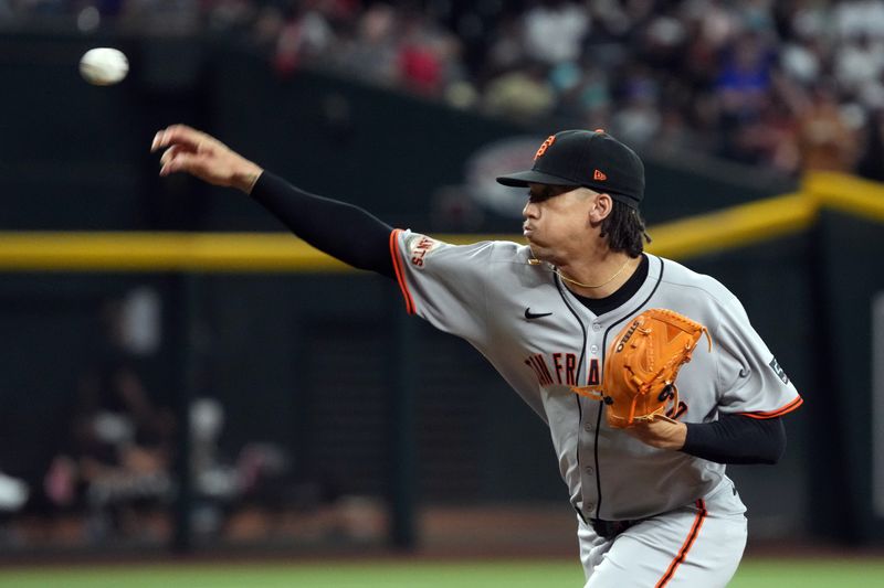 Sep 17, 2025; Phoenix, Arizona, USA; San Francisco Giants pitcher Spencer Bivens (76) throws against the Arizona Diamondbacks in the seventh inning at Chase Field. Mandatory Credit: Rick Scuteri-Imagn Images