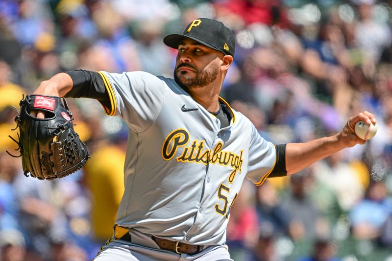 May 15, 2024; Milwaukee, Wisconsin, USA; Pittsburgh Pirates pitcher Martin Perez (54) throws a pitch in the first inning against the Milwaukee Brewers at American Family Field. Mandatory Credit: Benny Sieu-USA TODAY Sports