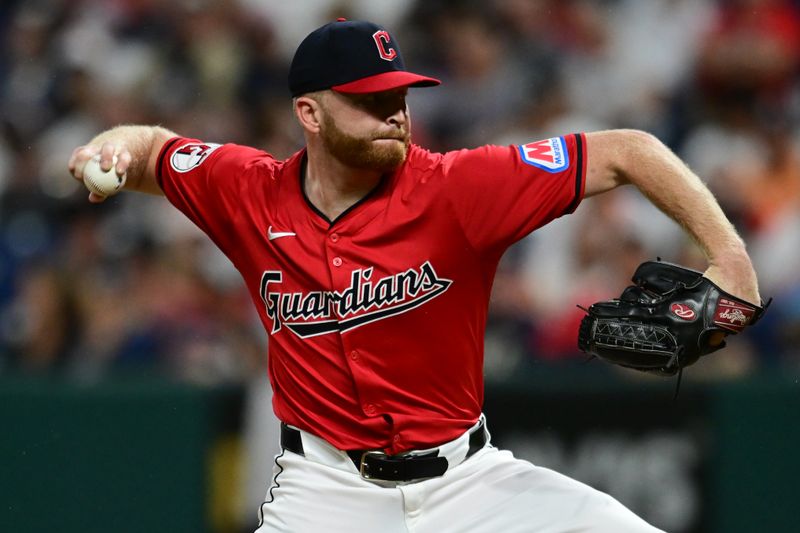 Sep 28, 2024; Cleveland, Ohio, USA; Cleveland Guardians relief pitcher Andrew Walters (63) throws a pitch during the fifth inning against the Houston Astros at Progressive Field. Mandatory Credit: Ken Blaze-Imagn Images