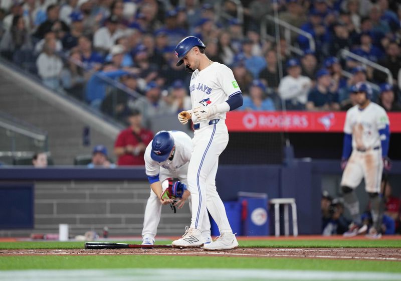 Apr 15, 2024; Toronto, Ontario, CAN; Toronto Blue Jays second base Cavan Biggio wearing number 42 for Jackie Robinson Day scores on a walk against the New York Yankees during the second inning at Rogers Centre. Mandatory Credit: Nick Turchiaro-USA TODAY Sports