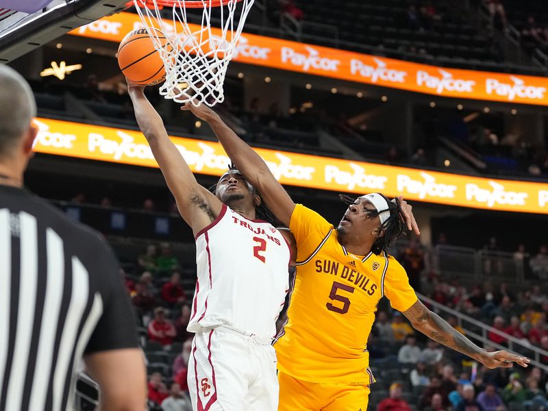 Mar 9, 2023; Las Vegas, NV, USA; USC Trojans guard Reese Dixon-Waters (2) is fouled by Arizona State Sun Devils forward Jamiya Neal (5) during the second half at T-Mobile Arena. Mandatory Credit: Stephen R. Sylvanie-USA TODAY Sports