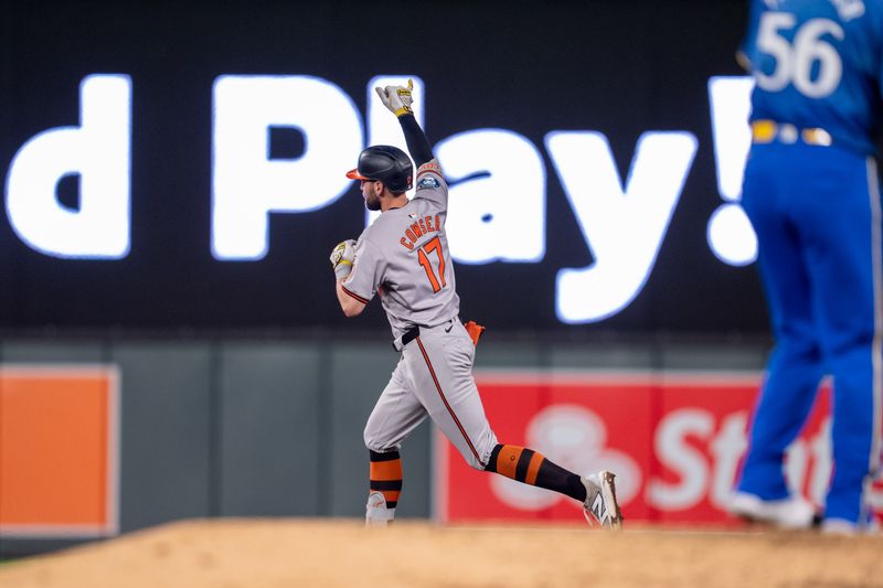 Sep 27, 2024; Minneapolis, Minnesota, USA; Baltimore Orioles left fielder Colton Cowser (17) hits a home run off Minnesota Twins pitcher Caleb Thielbar (56) in the sixth inning at Target Field. Mandatory Credit: Matt Blewett-Imagn Images